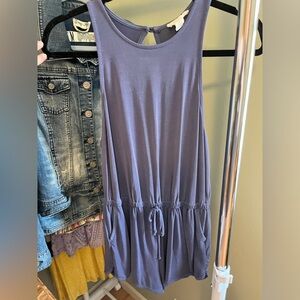 Cute Purple romper. Open back with drawstring waist